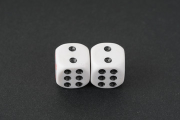 a dice over black surface