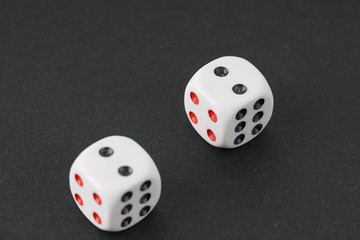 a dice over black surface
