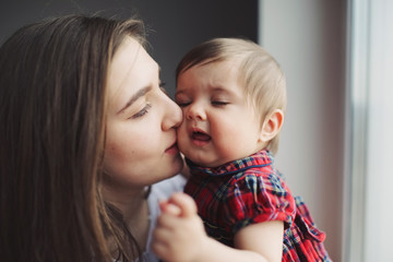 portrait of happy young mother with daughter