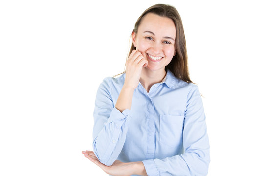 portrait of a young happy woman smiling and thinking with hands on cheeks on white background