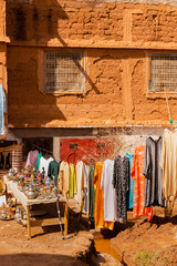 Clothes and souvenirs in a street store near Ait Benhaddou village in Morocco