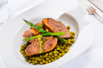 Grilled duck breast with vegetables