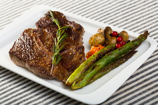 Image of beef entrecote with mushroom and asparagus