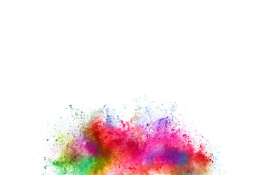 Multicolor powder explosion on White background. Colored cloud. Colorful dust explode. Paint Holi. © kitsana
