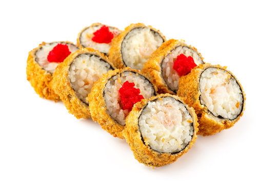 Closeup set of tempura fried sushi rolls with tobico and shrimps isolated at white background.
