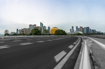 urban traffic road with cityscape in background, China.