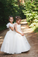 happy beautiful girls with white wedding dresses