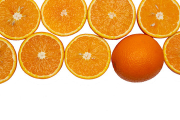 slices of fresh orange on white background. Closeup.
