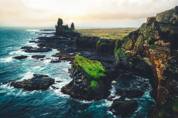 Londrangar in Snaefellsnes National Park, Iceland. Londrangar and hill Svalthufa are remains of a...