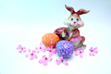 Easter bunny and painted eggs - Easter symbol