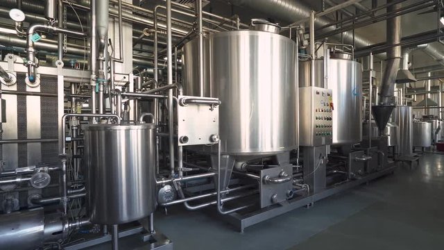 equipment for mixing and production of ice cream, view of steel tanks and containers