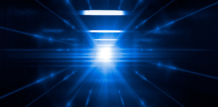 Dark blue tunnel, a ray of light. Abstract blue background. © MiaStendal