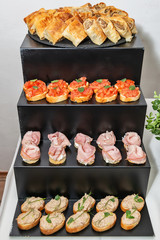 Mushroom pie, bruschetti with tomato, pate and ham