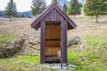 Fototapeta na wymiar A typical Alpine Little House, common high up in the mountains where there are no facilities