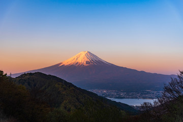 Fototapeta na wymiar Mount Fuji sunrise with cityspace