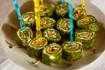 Delicious Canapes snacks with cheese on the buffet table