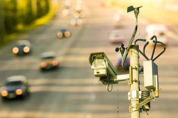 video camera on the road, against the background of cars. commit violations of speed limits, rules...