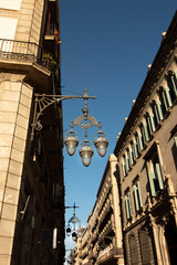 Fototapeta na wymiar Street lights in the Gothic quarter, Barcelona, Catalonia, Spain