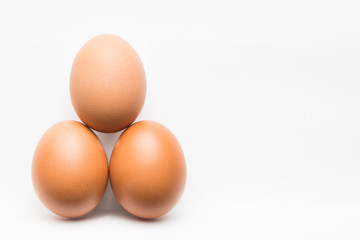 Balance of three chicken eggs