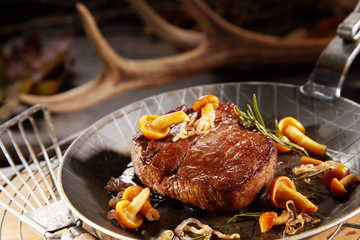 Gourmet thick marinated grilled wild venison steak
