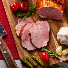 Meat with vegetables on the board