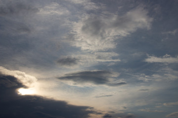 Fototapeta premium Beautiful sunset in the clouds, bright sun