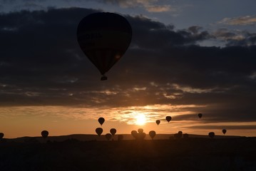Sunrise and balloons. Beautiful background of the balloon and the sunset.Cappadocia. Turkey. Göreme. Nevşehir. Türkiye. 