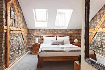 Luxurious modern loft bedroom interior with twin bed