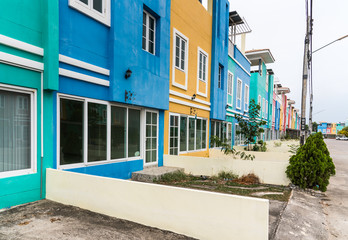 colored houses in the street