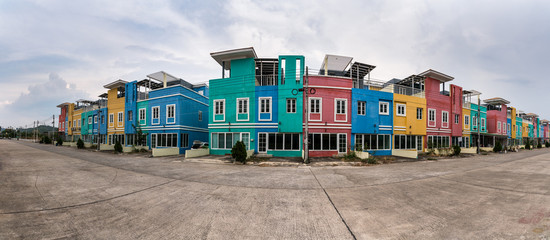 Naklejka premium colored houses in the street