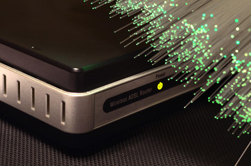 ADSL modem router with luminescent fiber optic lights