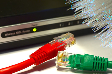 Detail of ADSL modem router with luminescent fiber optic lights and lan cable rj45