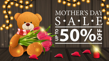 Discount banner for women's day with garland, candle, petal and Teddy bear with a bouquet of tulips