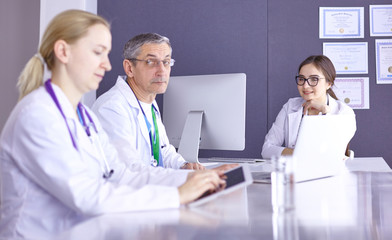 Fototapeta premium Doctors having a medical discussion in a meeting room