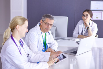 Doctors having a medical discussion in a meeting room