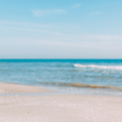 Fototapeta na wymiar Summer sand beach and seashore waves background