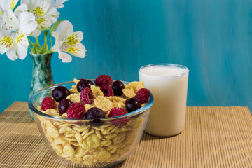 cornflakes with berries for breakfast and flowers for a good mood