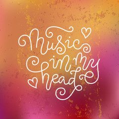 Modern calligraphy lettering of Music in my head in white on orange pink background with texture