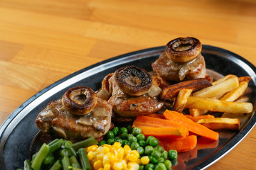 Close up of delicious food on wooden table.