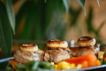 Close up of delicious food on brown table.