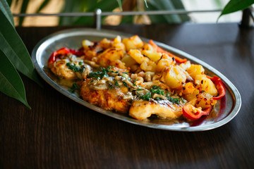 Close up of delicious food on brown table.