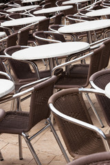 tables and chairs in a cafe