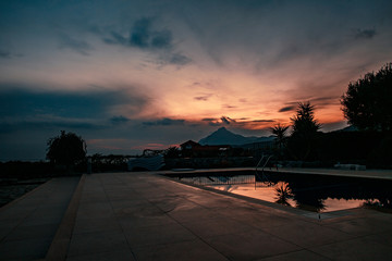 dawn at home in the mountains with a swimming pool.Sunset in a beautiful place