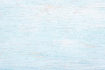 Light blue painted wooden background