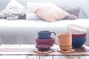 still life interior decor with home utensils on a wooden table