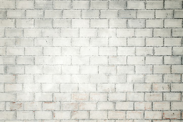 Old white bricks wall background or texture