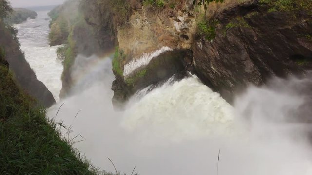 Murchison Falls National Park In Uganda, Showing A Rainbow Forming