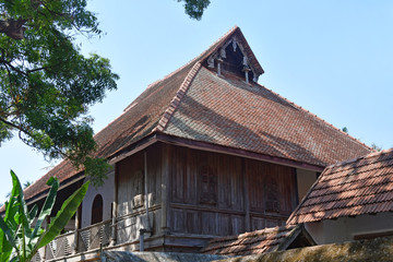 Fototapeta na wymiar Fragment of ancient wooden Palace of Maharaja Padmanabhapuram in Trivandrum, Kerala