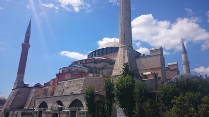 Hagia Sophia domes and minarets in the old town of Istanbul, Turkey, on sunset.