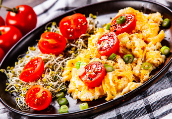 Breakfast - scrambled eggs with vegetables